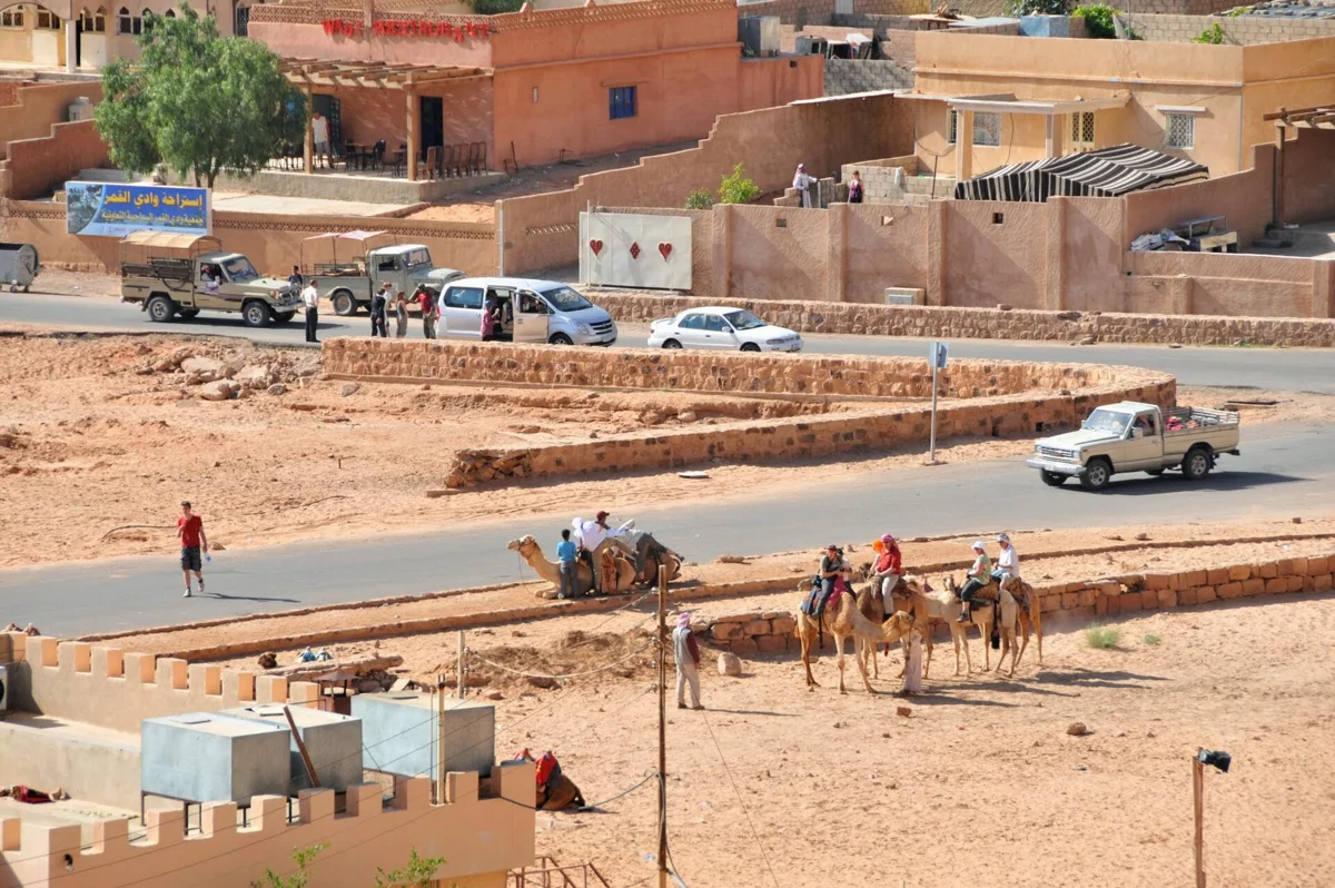 Rum Village below the cliffs, where many camps for a Wadi Rum stargazing night are based